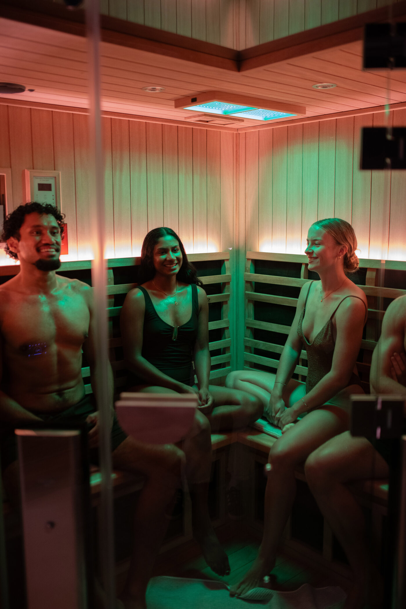 A guest inside the infrared sauna at Boon Wellness